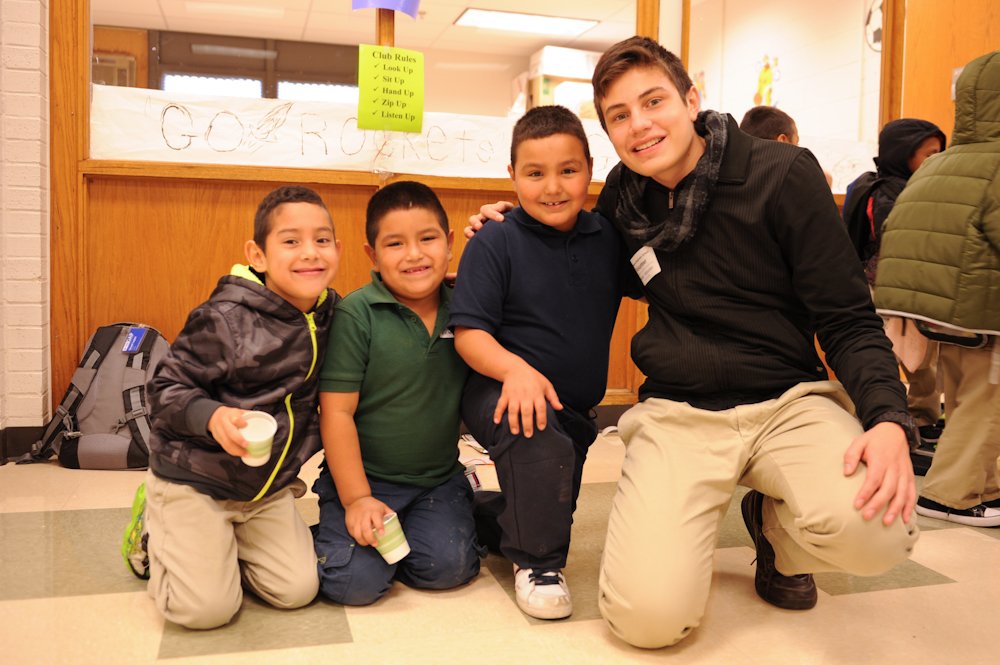 Ricardo with students at Bible club